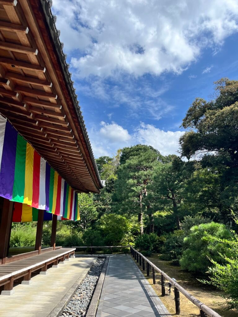 kyoto shrine in summer with colorful flags